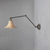 Savannah Adjustable Arm Wall Light with Small Bell-Shaped Rattan Shade Brass Wall Lights Great Lighting UK Ltd